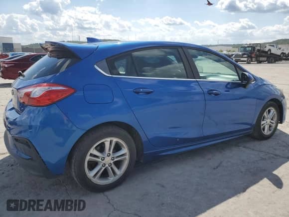 2017 Chevrolet Cruze LT с VIN 3G1BE6SM6HS617249, выставлен на аукционе Copart как лот 84380095 с пробегом 119 148 миль миль и На запчасти • Non repairable. История ставок и продаж доступна на DreamBid. Изображение 3.
