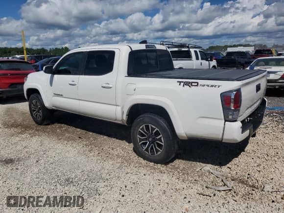 2020 Toyota Tacoma SR5 с VIN 3TMAZ5CNXLM128164, выставлен на аукционе Copart как лот 71077555 с пробегом 79 553 миль миль и Чистый • Clean title. История ставок и продаж доступна на DreamBid. Изображение 2.