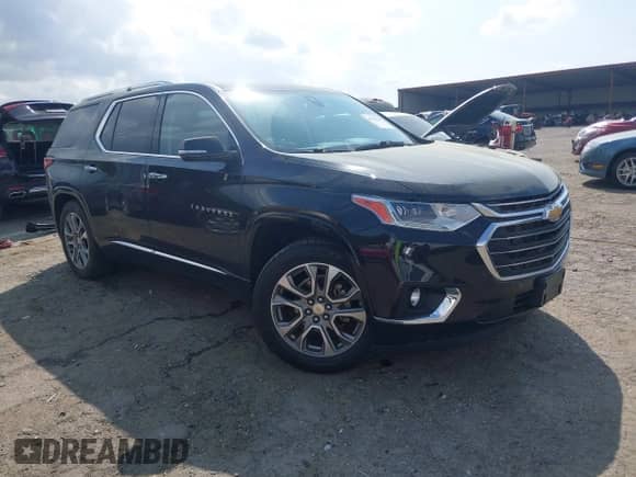 2020 Chevrolet Traverse Premier with VIN 1GNERKKW0LJ123828, listed as a IAAI auction lot 41947690 with 91,905 mi miles and . Bid and sale history available at DreamBid. Image 1.