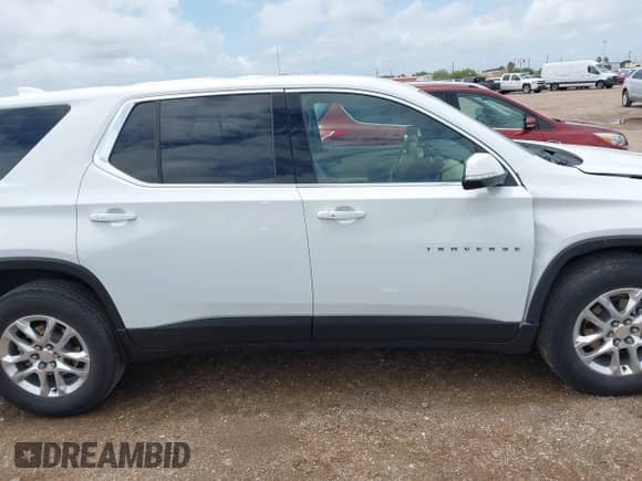 2023 Chevrolet Traverse LS z VIN 1GNERFKW0PJ168703, wystawiony jako IAAI lot #42638224 z przebiegiem 56 743 mil mil oraz . Historia ofert i sprzedaży dostępna na DreamBid. Obrazek 13.