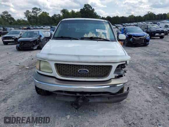 2003 Ford F-150 XL with VIN 1FTRX17L53NB86134, listed as a Copart auction lot 71982755 with 225,940 mi miles and Salvage title. Bid and sale history available at DreamBid. Image 5.