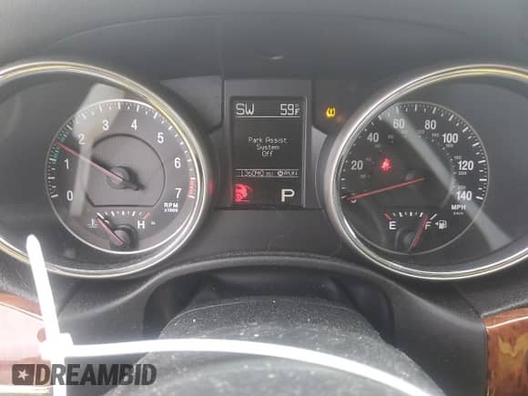 2012 Jeep Grand Cherokee Limited z VIN 1C4RJFBG2CC187150, wystawiony jako Copart lot #84956805 z przebiegiem 136 040 mil mil oraz Szkoda całkowita • Salvage title. Historia ofert i sprzedaży dostępna na DreamBid. Obrazek 9.