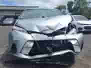 2019 Toyota Sienna L with VIN 5TDZZ3DC2KS005851, listed as a IAAI auction lot 41992778 with 99,580 mi miles and . Bid and sale history available at DreamBid. Image 12.