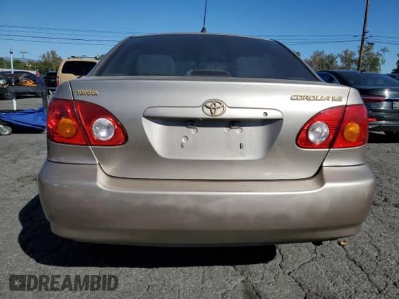 2004 Toyota Corolla CE z VIN 1NXBR32E94Z301126, wystawiony jako Copart lot #87467835 z przebiegiem 181 189 mil mil oraz Szkoda całkowita • Salvage title. Historia ofert i sprzedaży dostępna na DreamBid. Obrazek 6.