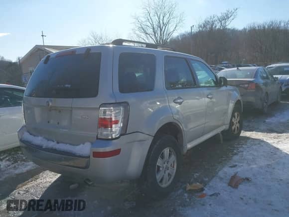 2008 Mercury Mariner with VIN 4M2CU91Z68KJ45797, listed as a IAAI auction lot 41615117 with 87,936 mi miles and . Bid and sale history available at DreamBid. Image 4.