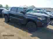 2021 Toyota Tacoma Limited with VIN 3TMGZ5AN8MM390280, listed as a IAAI auction lot 42869454 with 61,704 mi miles and . Bid and sale history available at DreamBid. Image 1.