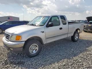 2004 Ford F-150 XL with VIN 2FTRX18WX4CA54373, listed as a Copart auction lot 63733095 with Not provided miles and Salvage title. Bid and sale history available at DreamBid. Image 1.