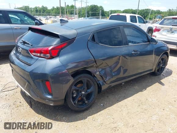 2019 Hyundai Veloster 2.0 z VIN KMHTG6AFXKU016745, wystawiony jako IAAI lot #42137343 z przebiegiem 90 095 mil mil oraz . Historia ofert i sprzedaży dostępna na DreamBid. Obrazek 4.