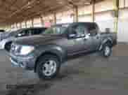 2007 Nissan Frontier SE with VIN 1N6AD07U67C431739, listed as a Copart auction lot 86591175 with 131,668 mi miles and Salvage title. Bid and sale history available at DreamBid. Image 1.