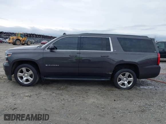 2015 Chevrolet Suburban LT with VIN 1GNSKJKC4FR226103, listed as a IAAI auction lot 43371366 with 234,764 mi miles and . Bid and sale history available at DreamBid. Image 14.