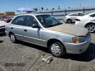 2002 Hyundai Accent GL с VIN KMHCG45C92U353198, выставлен на аукционе Copart как лот 68305654 с пробегом 130 594 миль миль и Чистый • Clean title. История ставок и продаж доступна на DreamBid. Изображение 4.