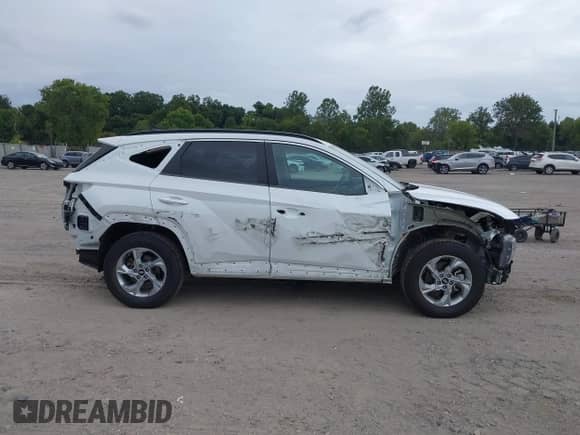 2022 Hyundai Tucson SEL with VIN 5NMJBCAE4NH016672, listed as a IAAI auction lot 43235714 with 29,070 mi miles and . Bid and sale history available at DreamBid. Image 13.