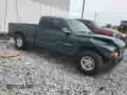 1999 Dodge Dakota SLT with VIN 1B7GL22X8XS283614, listed as a Copart auction lot 59412515 with 69,705 mi miles and Salvage title. Bid and sale history available at DreamBid. Image 4.