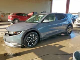 2023 Hyundai Ioniq 5 SEL с VIN KM8KNDAF4PU229591, выставлен на аукционе Copart как лот 85277655 с пробегом 25 066 миль миль и На запчасти • Non repairable. История ставок и продаж доступна на DreamBid. Изображение 1.