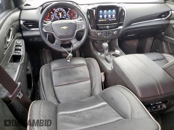 2023 Chevrolet Traverse Premier z VIN 1GNERKKW4PJ178661, wystawiony jako Copart lot #63104075 z przebiegiem 35 802 mil mil oraz Czysty tytuł • Clean title. Historia ofert i sprzedaży dostępna na DreamBid. Obrazek 8.