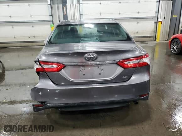 2018 Toyota Camry SE с VIN 4T1B11HK1JU639754, выставлен на аукционе Copart как лот 83947475 с пробегом 87 630 миль миль и Списание • Salvage title. История ставок и продаж доступна на DreamBid. Изображение 6.