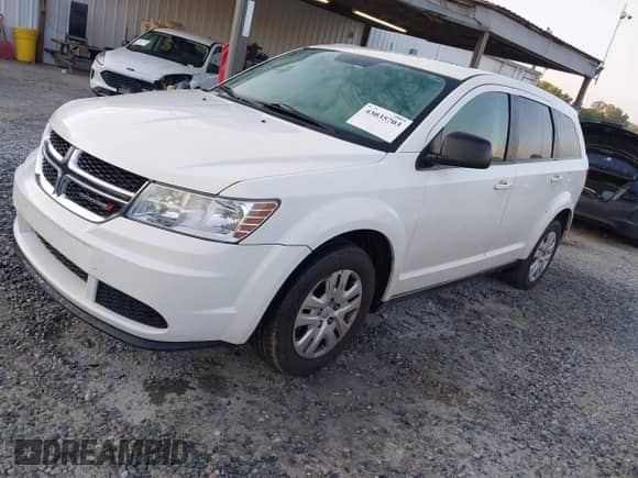 2015 Dodge Journey American Value z VIN 3C4PDCAB8FT605870, wystawiony jako IAAI lot #43035703 z przebiegiem 215 596 mil mil oraz . Historia ofert i sprzedaży dostępna na DreamBid. Obrazek 2.