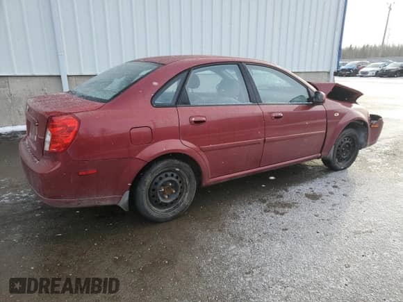 2005 Chevrolet Optra LS с VIN KL1JK59Z25K101251, выставлен на аукционе Copart как лот 87930375 с пробегом 93 894 миль миль и Списание • Salvage title. История ставок и продаж доступна на DreamBid. Изображение 3.