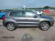 2012 Volkswagen Tiguan S с VIN WVGAV7AX1CW004596, выставлен на аукционе IAAI как лот 42772345 с пробегом 93 758 миль миль и . История ставок и продаж доступна на DreamBid. Изображение 13.