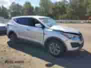 2015 Hyundai Santa Fe z VIN 5XYZTDLB7FG301905, wystawiony jako Copart lot #70538585 z przebiegiem 76 277 mil mil oraz Szkoda całkowita • Salvage title. Historia ofert i sprzedaży dostępna na DreamBid. Obrazek 4.