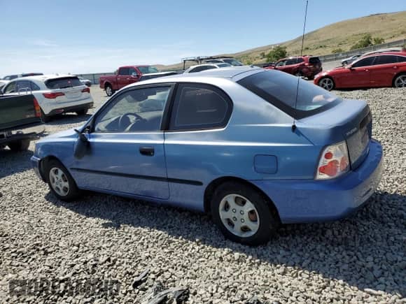 2002 Hyundai Accent z VIN KMHCF35G72U206880, wystawiony jako Copart lot #62286955 z przebiegiem 200 952 mil mil oraz Szkoda całkowita • Salvage title. Historia ofert i sprzedaży dostępna na DreamBid. Obrazek 2.