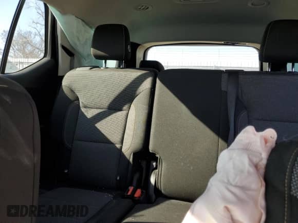 2018 Chevrolet Traverse z VIN 1GNEREKW8JJ281199, wystawiony jako Copart lot #42822565 z przebiegiem 122 435 mil mil oraz Szkoda całkowita • Salvage title. Historia ofert i sprzedaży dostępna na DreamBid. Obrazek 10.