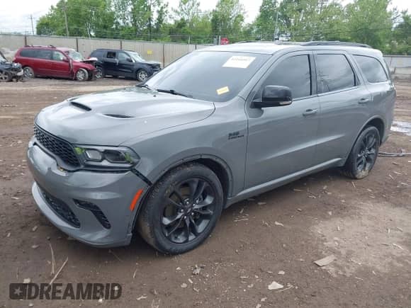 2023 Dodge Durango R/T Plus with VIN 1C4SDJCT1PC582028, listed as a IAAI auction lot 42244917 with 52,276 mi miles and . Bid and sale history available at DreamBid. Image 2.