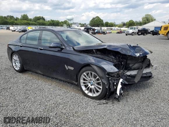 2015 BMW 7 Series 750i xDrive with VIN WBAYB6C58FD966084, listed as a Copart auction lot 61875325 with 159,616 mi miles and Salvage title. Bid and sale history available at DreamBid. Image 4.