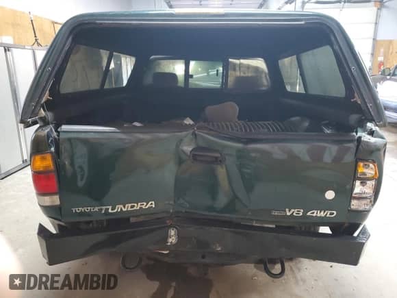 2002 Toyota Tundra SR5 z VIN 5TBBT44112S276660, wystawiony jako Copart lot #84750795 z przebiegiem 235 326 mil mil oraz Czysty tytuł • Clean title. Historia ofert i sprzedaży dostępna na DreamBid. Obrazek 6.