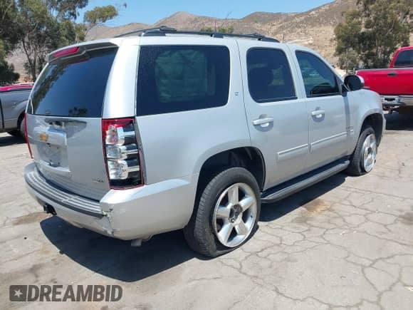 2012 Chevrolet Tahoe LT with VIN 1GNSCBE06CR255554, listed as a IAAI auction lot 42544690 with 136,070 mi miles and . Bid and sale history available at DreamBid. Image 4.
