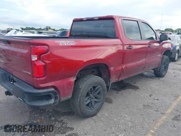 2021 Chevrolet Silverado 1500 Custom Trail Boss with VIN 1GCPYCEF8MZ266566, listed as a IAAI auction lot 42639628 with 102,975 mi miles and . Bid and sale history available at DreamBid. Image 4.