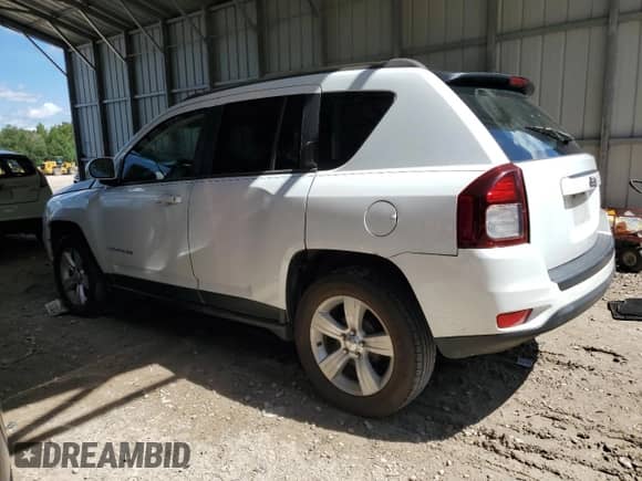 2014 Jeep Compass Latitude with VIN 1C4NJCEB9ED826084, listed as a Copart auction lot 72266434 with 103,718 mi miles and Salvage title. Bid and sale history available at DreamBid. Image 2.