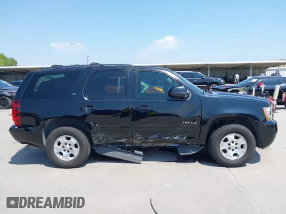 2014 Chevrolet Tahoe LT with VIN 1GNSCBE07ER190040, listed as a IAAI auction lot 42393145 with 111,605 mi miles and . Bid and sale history available at DreamBid. Image 13.