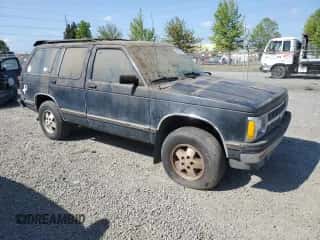 1992 Chevrolet Blazer z VIN 1GNDT13Z7N2122916, wystawiony jako Copart lot #54979365 z przebiegiem Nie podano mil oraz Czysty tytuł • Clean title. Historia ofert i sprzedaży dostępna na DreamBid. Obrazek 4.