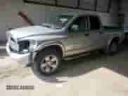 2006 Dodge 1500 SLT with VIN 1D7HU18N76S554359, listed as a Copart auction lot 68918175 with 146,886 mi miles and Salvage title. Bid and sale history available at DreamBid. Image 1.