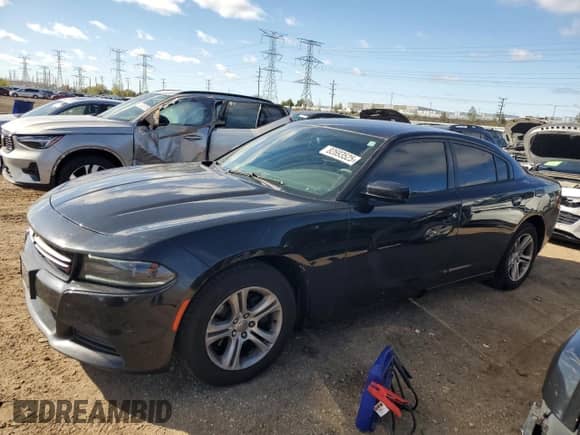 2015 Dodge Charger SE with VIN 2C3CDXBG8FH927647, listed as a Copart auction lot 82693525 with 178,780 mi miles and Clean title. Bid and sale history available at DreamBid. Image 1.
