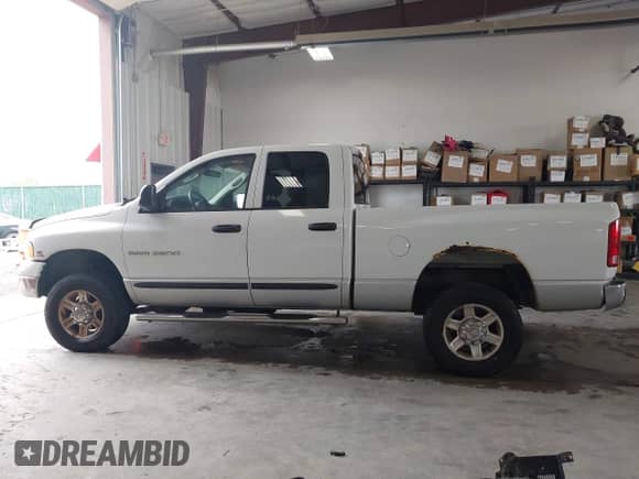 2004 Dodge 2500 SLT with VIN 3D7KU28C74G145468, listed as a IAAI auction lot 42100605 with 344,833 mi miles and . Bid and sale history available at DreamBid. Image 14.