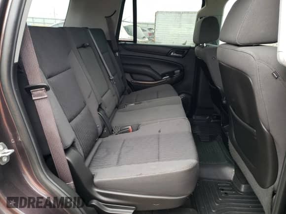 2015 Chevrolet Tahoe LS with VIN 1GNSKAKC8FR106403, listed as a Copart auction lot 84555905 with 132,936 mi miles and Salvage title. Bid and sale history available at DreamBid. Image 11.