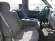 1999 Chevrolet Silverado 1500 with VIN 1GCEK14VXXZ138517, listed as a IAAI auction lot 43337673 with Not provided miles and . Bid and sale history available at DreamBid. Image 8.