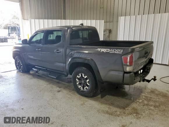 2023 Toyota Tacoma TRD Off Road with VIN 3TMCZ5ANXPM556723, listed as a Copart auction lot 81642695 with 53,753 mi miles and Clean title. Bid and sale history available at DreamBid. Image 2.