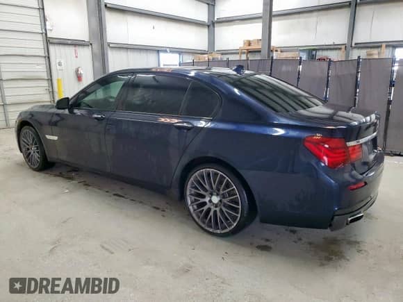 2015 BMW 7 Series 750Li с VIN WBAYE8C55FD780831, выставлен на аукционе Copart как лот 70322985 с пробегом 117 567 миль миль и Чистый • Clean title. История ставок и продаж доступна на DreamBid. Изображение 2.