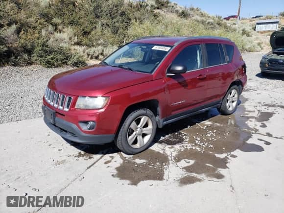 2014 Jeep Compass Sport with VIN 1C4NJDBB8ED567758, listed as a Copart auction lot 67984065 with 123,788 mi miles and Salvage title. Bid and sale history available at DreamBid. Image 1.