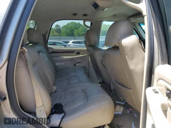 2002 Cadillac Escalade z VIN 1GYEC63T92R172834, wystawiony jako Copart lot #53606245 z przebiegiem 310 791 mil mil oraz Szkoda całkowita • Salvage title. Historia ofert i sprzedaży dostępna na DreamBid. Obrazek 11.