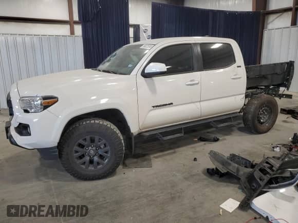 2023 Toyota Tacoma SR5 with VIN 3TYAZ5CN2PT042244, listed as a Copart auction lot 76022534 with 9,551 mi miles and Salvage title. Bid and sale history available at DreamBid. Image 1.