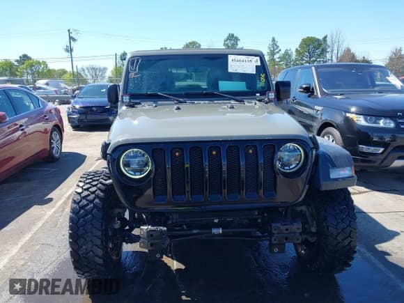 2022 Jeep Wrangler Unlimited Sport S z VIN 1C4HJXDG1NW200793, wystawiony jako IAAI lot #41810817 z przebiegiem 35 212 mil mil oraz . Historia ofert i sprzedaży dostępna na DreamBid. Obrazek 12.