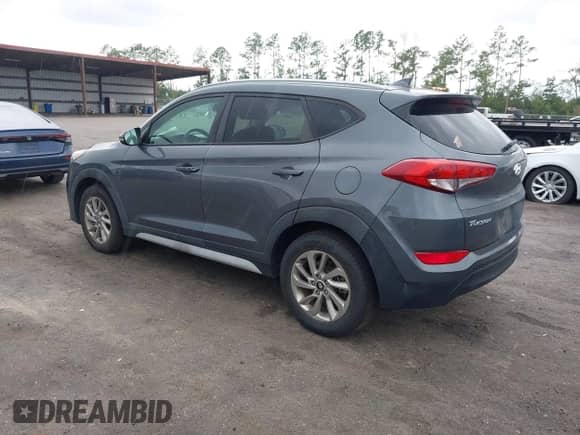2017 Hyundai Tucson SE with VIN KM8J33A46HU509332, listed as a IAAI auction lot 43161306 with 98,936 mi miles and . Bid and sale history available at DreamBid. Image 3.