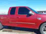 1999 Ford F-150 with VIN 1FTRX17W3XKB03527, listed as a IAAI auction lot 43450405 with 121,752 mi miles and . Bid and sale history available at DreamBid. Image 13.