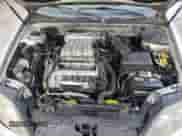 2003 Hyundai Tiburon GT с VIN KMHHN65F63U064962, выставлен на аукционе Copart как лот 44804045 с пробегом 186 171 миль миль и Списание • Salvage title. История ставок и продаж доступна на DreamBid. Изображение 12.