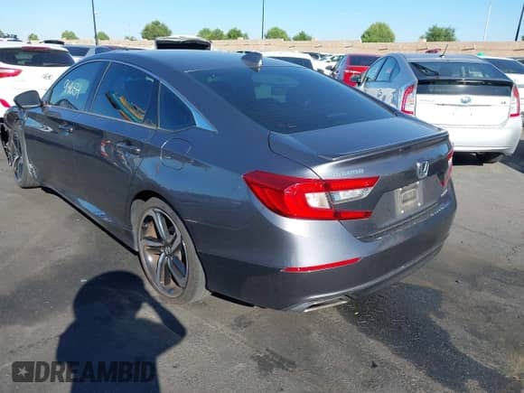 2020 Honda Accord Sport z VIN 1HGCV1F3XLA029852, wystawiony jako IAAI lot #43294654 z przebiegiem 71 234 mil mil oraz . Historia ofert i sprzedaży dostępna na DreamBid. Obrazek 3.