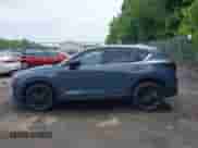 2023 Mazda CX-5 S Carbon Edition z VIN JM3KFBCM8P0223695, wystawiony jako IAAI lot #42379352 z przebiegiem 41 849 mil mil oraz . Historia ofert i sprzedaży dostępna na DreamBid. Obrazek 14.